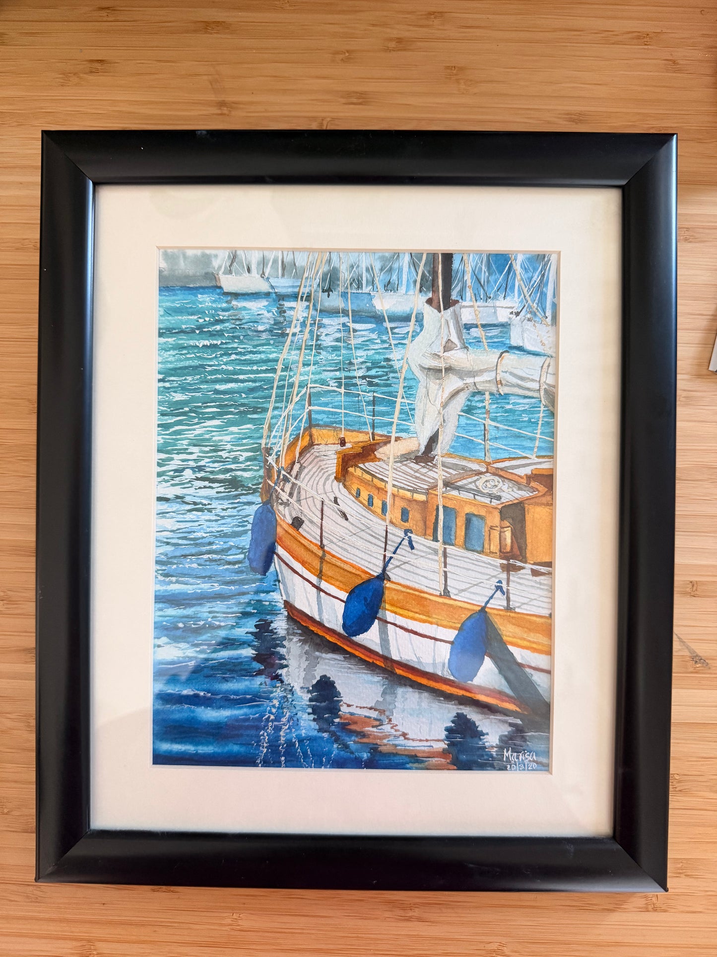 Boat by the bay watercolor painting framed