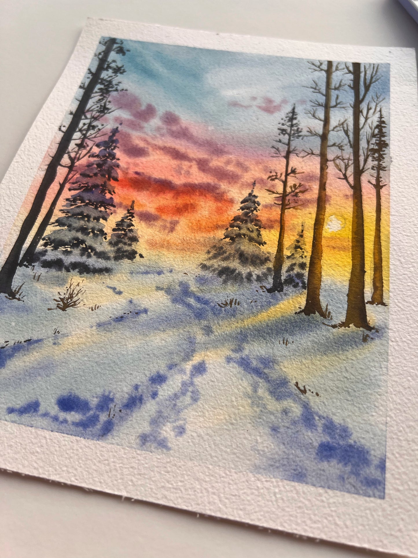 Sunset winter sky in watercolors