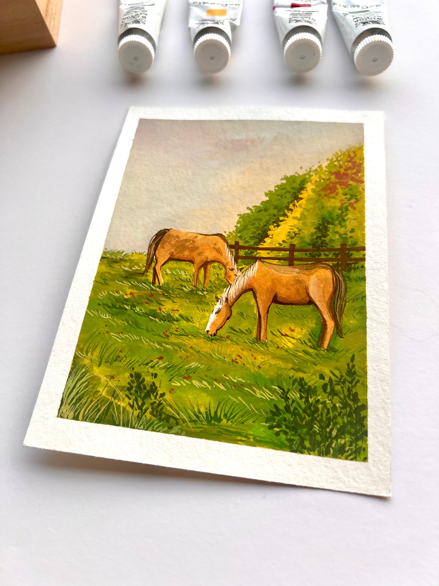 Horses grazing painting